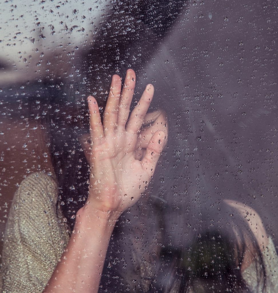 woman-behind-wet-glass (1215x1280)